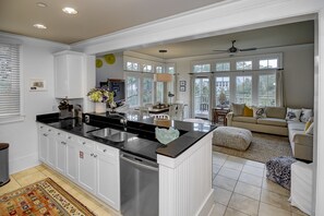 Main Floor Living with Easy Access from the Kitchen to the Living
