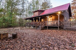 front of cabin with lights