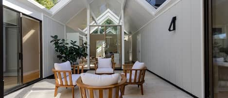 A view from inside with the atrium open on a sunny day in Palo Alto