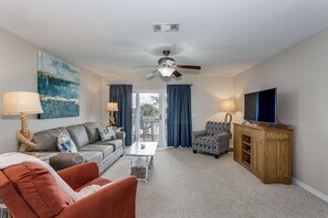 Sit back and relax in the comfortable living room which overlooks Perdido Bay