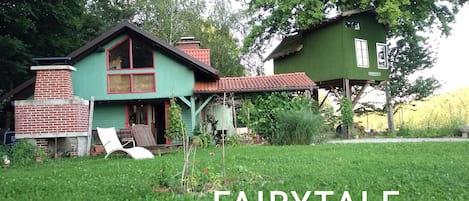 Fairytale wooden house by Ljubljana and tree house Ramona