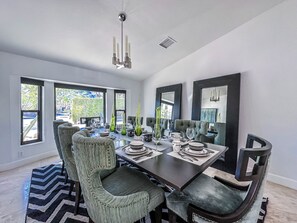 Beautiful Formal Dining Room and the table already set for your family gathering