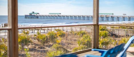 Enjoy beautiful ocean views from the screened in porch