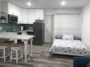 Kitchen and bed view