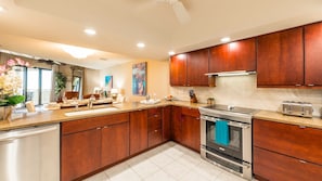 A large, spacious kitchen awaits your family chef...