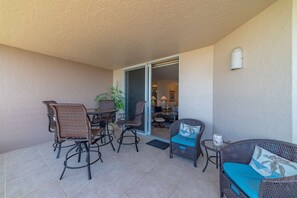 The expansive balcony offers plenty of room for the whole crew to gather for happy hour or to take in Marco's famed sunsets.