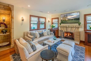 Inviting living room- cozy up by the fire and enjoy your favorite shows!