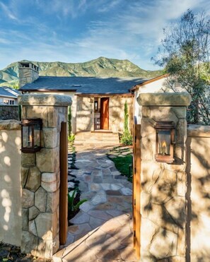 Front gate leading to the front of the house