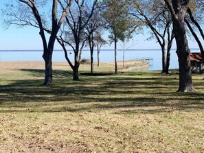 Beautiful point on 2 acre shared lot with shared fishing pier.