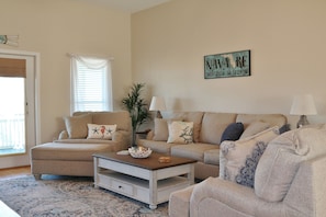 There is plenty of seating for everyone in your group in this open concept home.