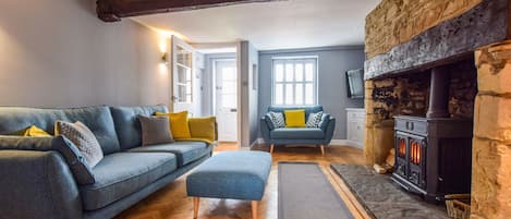 Sitting Room with log burner, 27 Horsefair, Bolthole Retreats