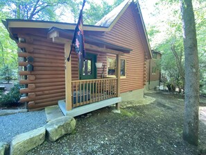 Right side of cabin with front entrance porch