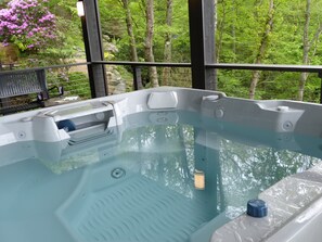 Soak in the Hot Tub on the Covered Deck