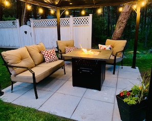 Gazebo with firepit and patio furniture. Yours to enjoy during your stay.