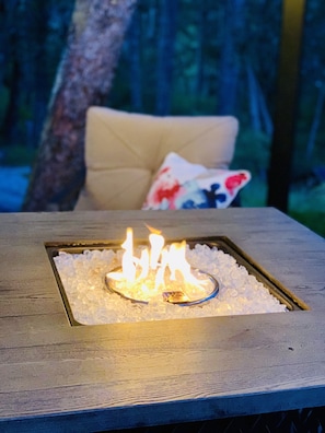 Relax by the firepit in the privacy of your own outdoor space.