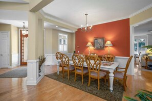 The home features wood floors, vaulted ceilings and large rooms.
