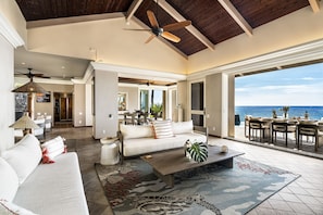 Vaulted ceilings with large sliding doors make this room spectacular