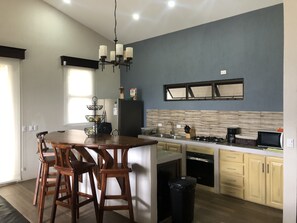 Kitchen view with blinds closed.