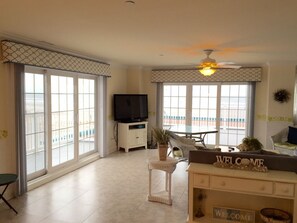Living room with access to two oceanfront balconies 