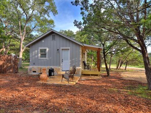 View of cabin and patio from left of cabin