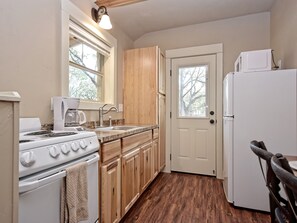 Kitchen area and side door to patio area