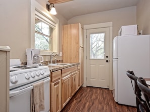Kitchen area and side door to patio area