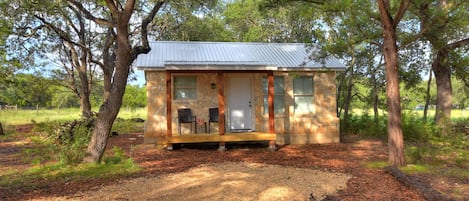 Front of cabin with parking area