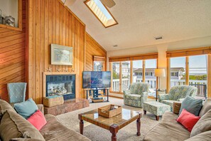 Top-Level Living Room with Deck Access