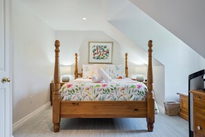 Super comfy queen size bed with Canadian pine furniture in Primary Bedroom.