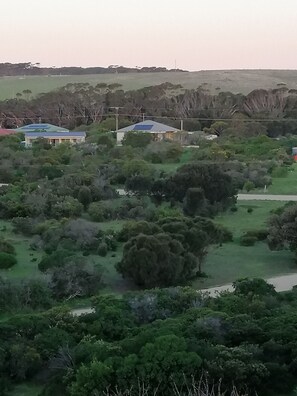 View of house (on right) from sand dunes in front of beach