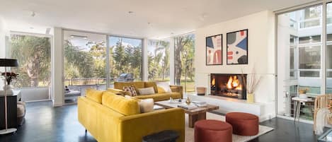 Welcome to Balboa Buyout! Stunning open living room with a fireplace in Balboa I.