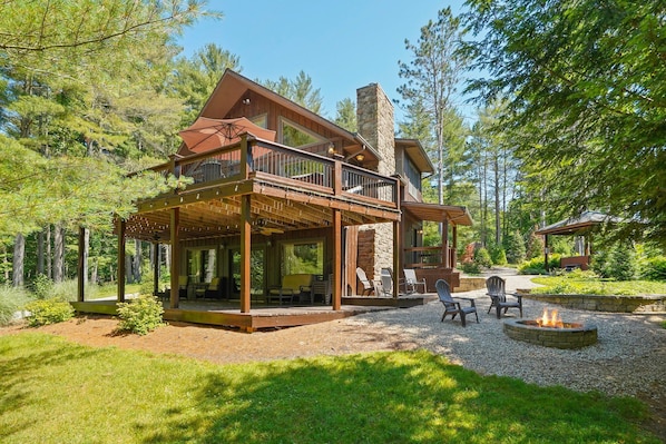 Beautiful cabin set amongst towering pines