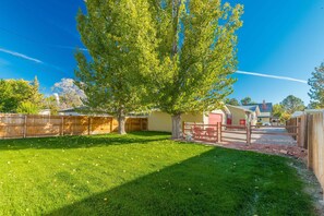 Large lush fenced in back yard