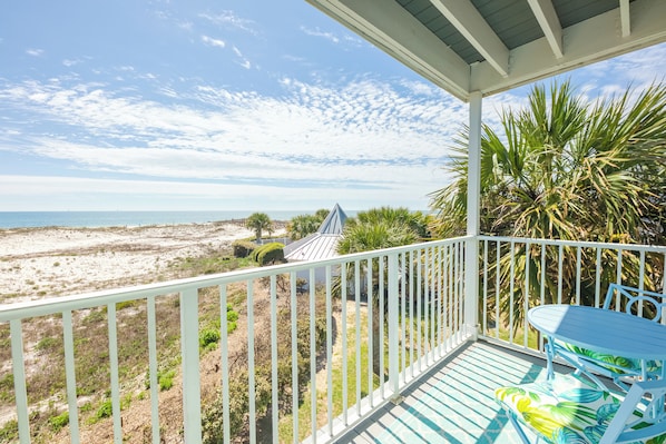 Balcony View! Seating for three plus a small table and breakfast table.