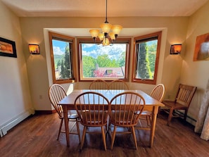The dining table has a lovely mountain view