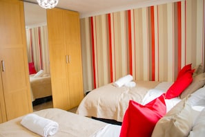 Bedroom 1 is an en-suite which includes a double bed and a single bed