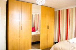 Bedroom 1- an en-suite which includes a double bed and a single bed