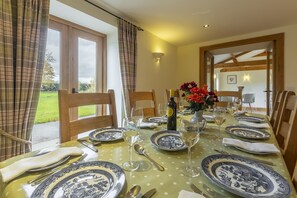 Prince's Barn, Neatishead: Dining area with electric log burner and views