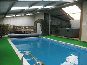 Shared swimming pool and hot tub | The Farmhouse, The Carthouse, The Orchard - Morlogws Farm Holiday Cottages, Capel Iwan, near Newcastle Emlyn