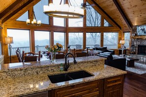 Kitchen, open living/ dining area with spectacular views 