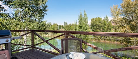 Outdoor seating area with lake views