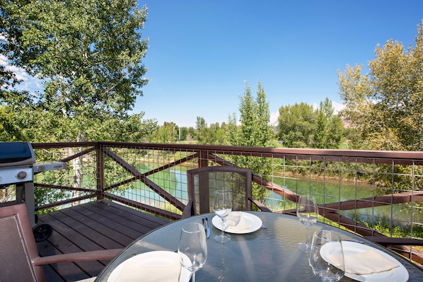 Outdoor seating area with lake views