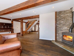 Welcoming living area with wood burner | Olive Lodge, Melbourne, near Derby