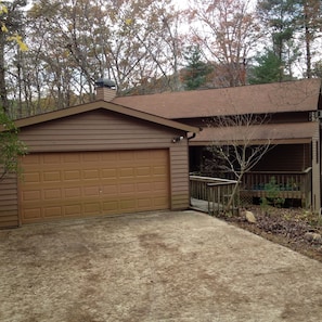 Driveway leads to front facing garage, direct access to kitchen