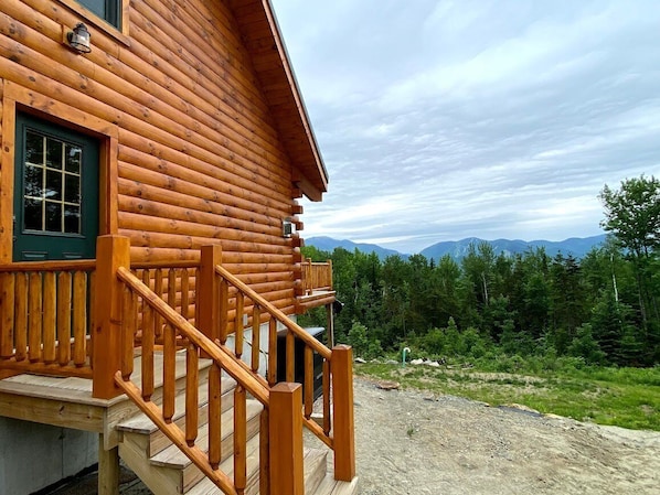 Perched on the hills above Franconia and Bethlehem, this breathtaking log home offers unbeatable views!