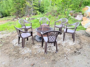 Access to the back yard from lower level which offer firepit!