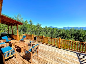 With a large back deck that has seating for 12, watching the sun set from this beautiful spot is a real treat!