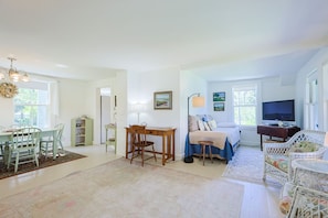 Open-plan living & dining room.