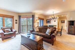 Living area offering a gas fireplace and cozy furnishings.