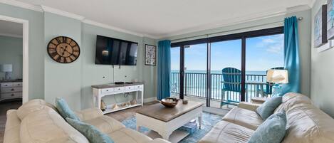 Relax and enjoy a gorgeous ocean view from the floor to ceiling windows.